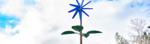 Wind turbine shaped like a blue flower
